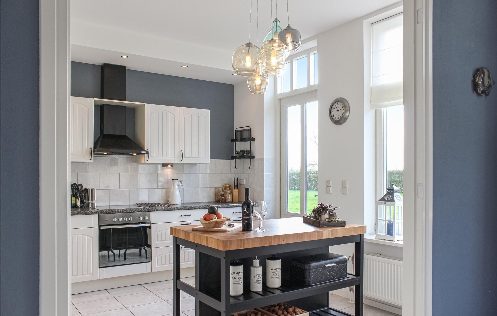 Fridge, stovetop, dishwasher, coffee/tea maker