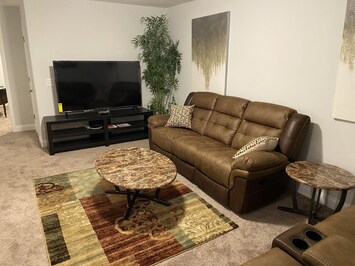 2nd floor living area with 65’ tv