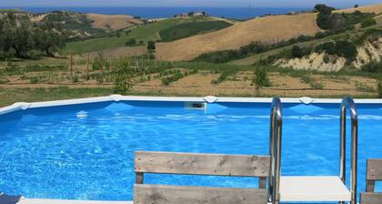 Lovely apartment in villa with WIFI, hot tub, pool, A/C, TV, patio, pets allowed and panoramic v...