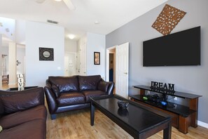 House, Multiple Beds, Private Pool, Pool View | Living room | 42-inch TV with cable channels - Cumbrian Lakes Villa (Kissimmee)