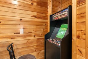 Enjoy classic vacation fun with the game room’s arcade game.
