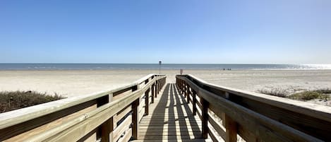 On the beach, sun-loungers