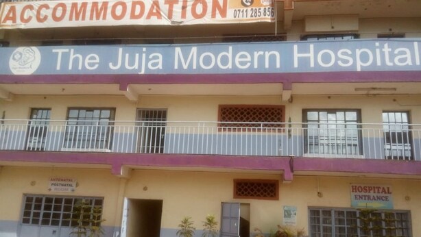 A building with a sign for 'The Juja Modern Hospital' and an 'ACCOMODATION' sign above it. - Juja Modern guest house (Juja)