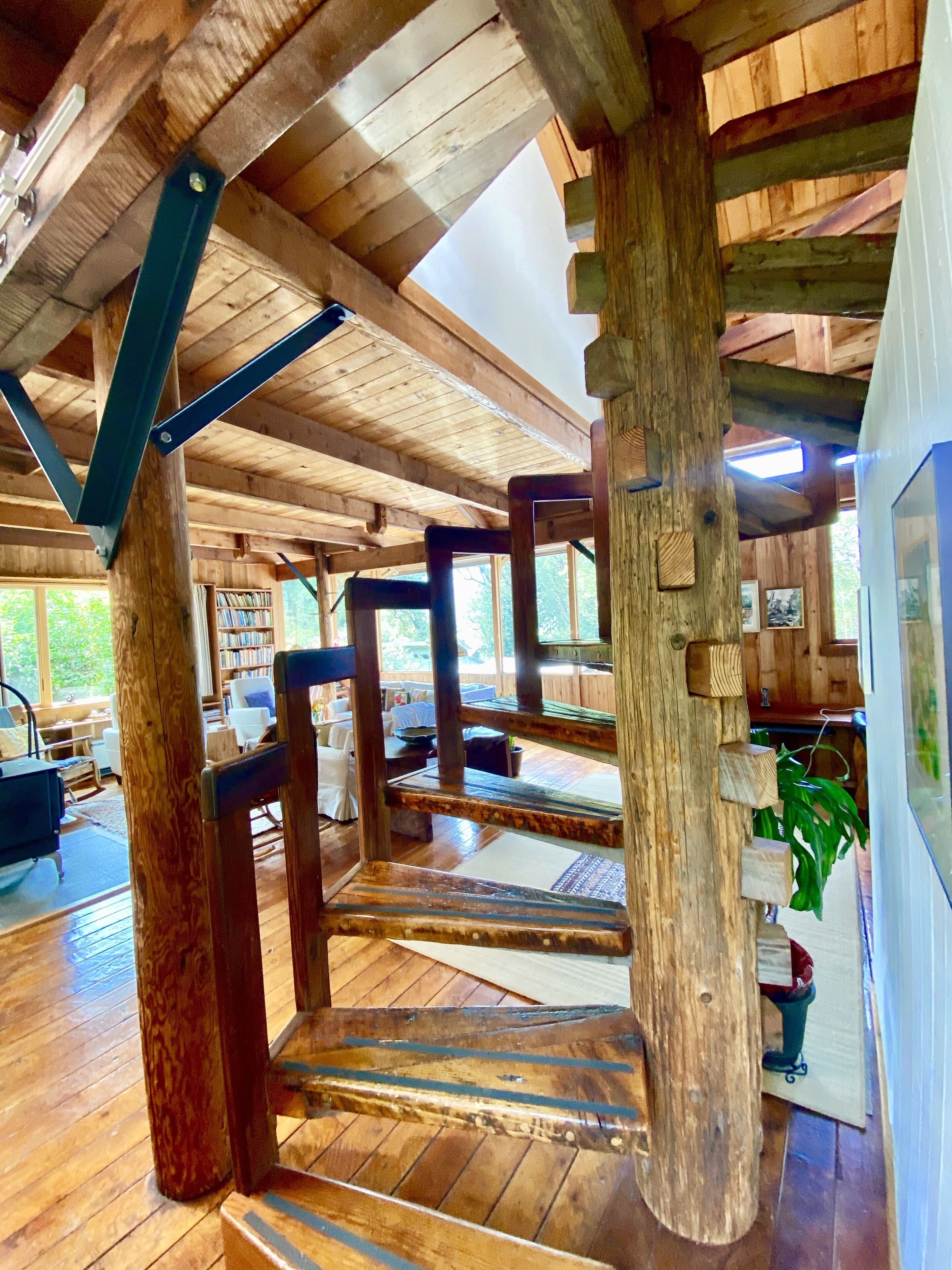 Spiral wooden staircase from 2nd to 3rd level. 
