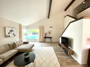 Smart TV, fireplace, books