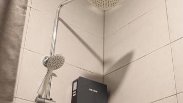 Family Room | Bathroom | Shower, hair dryer, bidet, towels