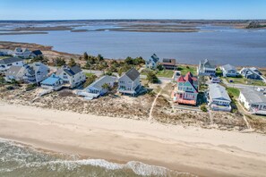 On the beach, sun-loungers, beach towels - 3BR/4BA Beach Front Property with Spectacular Water Views from Every Room!  (Milford)