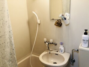 Apartment | Bathroom | Shower, free toiletries, hair dryer, slippers - L2 Shinjuku Apartment (Tokyo)