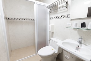 Quadruple Room | Bathroom | Shower, slippers, towels, soap