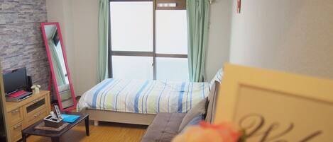 Appartamento (Free bike, Free portable WIFI, 203) | 1 camera, una scrivania, ferro/asse da stiro, Wi-Fi gratuito