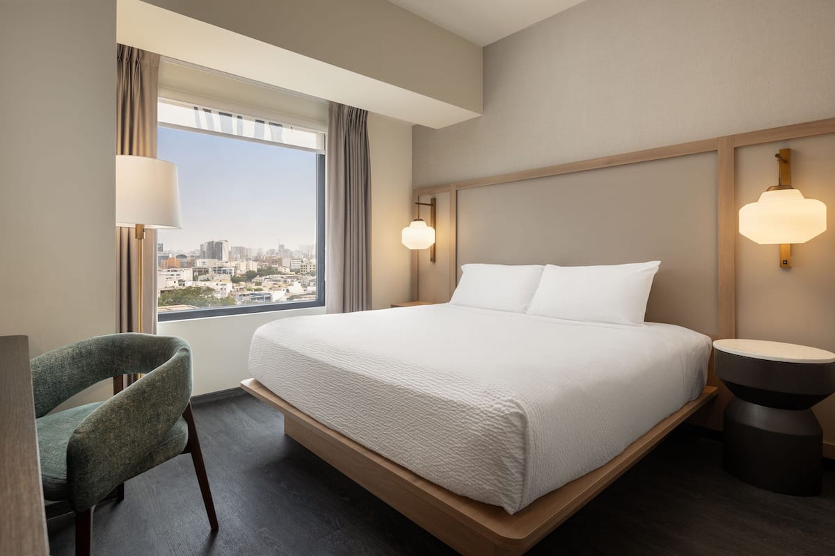 Egyptian cotton sheets, premium bedding, minibar, in-room safe