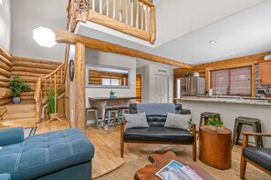 Televisio, takka, DVD-soitin, pöytätennispöytä