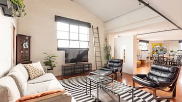 Design Apartment, 2 Bedrooms, Patio, City View | Living area | 58-inch Smart TV with digital channels, TV, Netflix