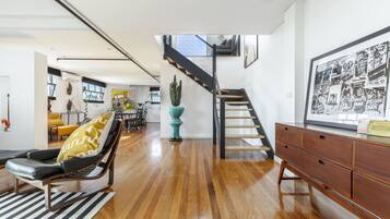 Design Apartment, 2 Bedrooms, Patio, City View | Living area | 58-inch Smart TV with digital channels, TV, Netflix