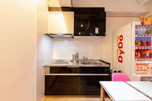 Standard Room (for 4 Guests, #703) | Shared kitchen | Fridge, microwave