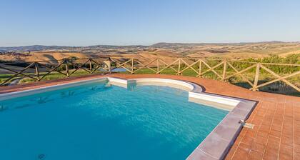 FARMHOUSE CASANOVA IN THE HILLS OF THE CRETE SENESI