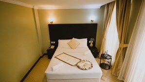 Standard Single Room, 1 Double Bed | Premium bedding, desk, soundproofing, iron/ironing board - Panone Hotel King'Ori (Arusha)