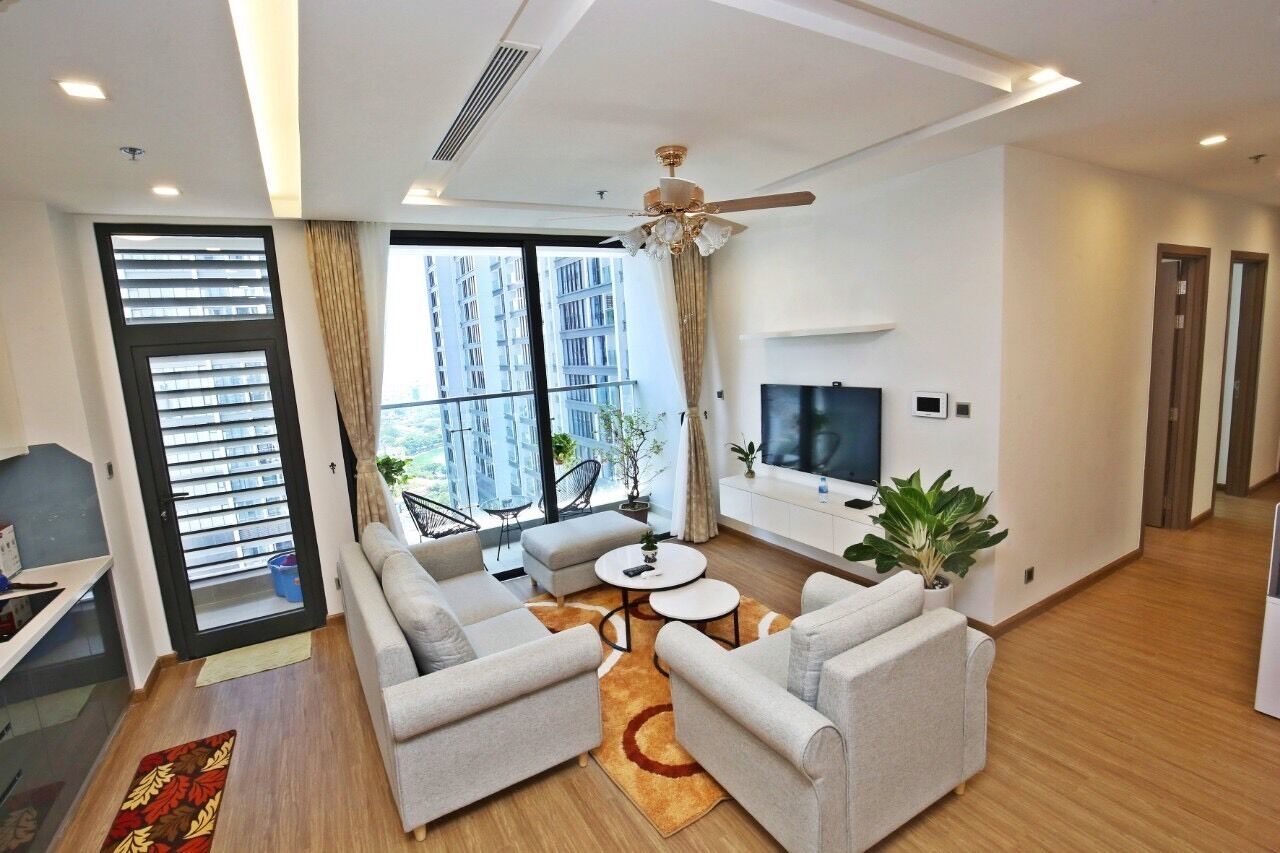 Family Apartment | Living area | 52-inch flat-screen TV with cable channels, TV, fireplace