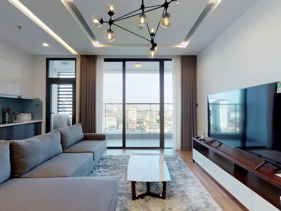 Deluxe Apartment | Living area | 52-inch flat-screen TV with cable channels, TV, fireplace