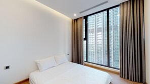 Deluxe Apartment | In-room safe, desk, blackout drapes, iron/ironing board - Homefromhome Metropolis Apartments (Hanoi)