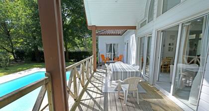 4* WOODEN VILLA ON THE GOLF COURSE, WITH HEATED POOL