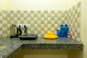 Deluxe Studio, 1 King Bed, Smoking, Kitchenette | Room amenity - Eat Sleep Wander Studio Apartments (New Delhi)
