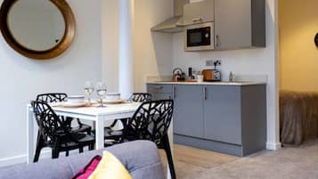 Apartment, 1 Bedroom | Private kitchen | Fridge, microwave, oven, stovetop