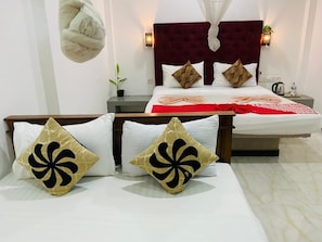 Standard Quadruple Room | Living area - AWON Hotel (Mirissa)