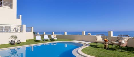 Outdoor pool, open 8:00 AM to 8:00 PM, pool umbrellas, pool loungers