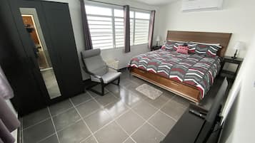 1 bedroom, desk, iron/ironing board, travel crib