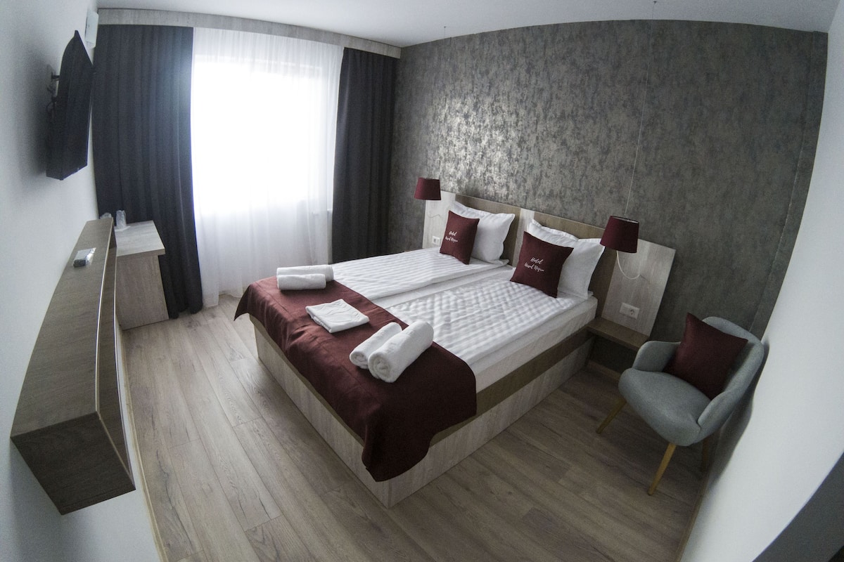Desk, laptop workspace, free WiFi, bed sheets