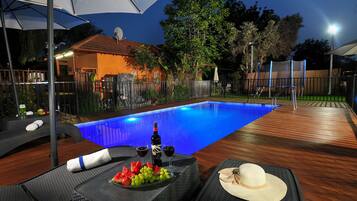 Seasonal outdoor pool, pool umbrellas, sun loungers