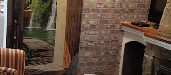 Little House With Fireplace And Terrace In Natural Environment