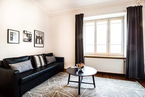 Departamento Confort | Sala de estar | Televisión de pantalla plana 