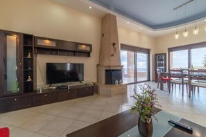 Deluxe Villa, 3 Bedrooms, Sea View | Living area | Smart TV, fireplace, heated floors