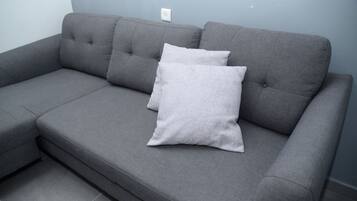 Family Apartment, 1 Bedroom, Ground Floor | Living area | 42-inch flat-screen TV with cable channels, TV