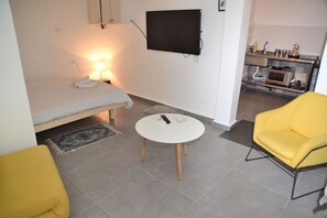 Economy Apartment, 1 Double Bed with Sofa bed, Ground Floor | Living area | 42-inch flat-screen TV with cable channels, TV - Stylish apt next to bograshov (Tel Aviv)