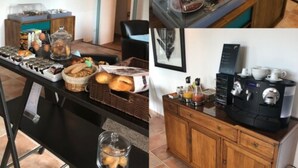 A breakfast buffet with various food items, a coffee machine, and a seating area with a chair. - Hotel Santa Lucia (Saint-Raphael)