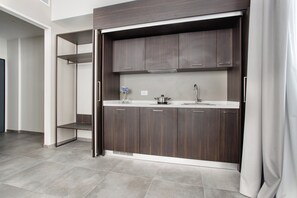 Monolocale Standard | Cucina privata | Frigorifero, macchina per caffè espresso