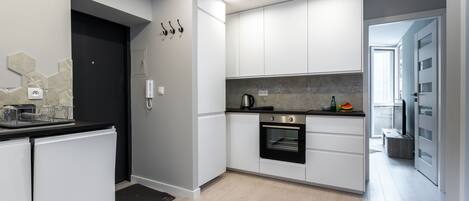 Apartment, 3 Bedrooms | Private kitchen | Fridge, oven, stovetop, dishwasher