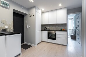 Appartement, 3 slaapkamers | Privékeuken | Een koelkast, een oven, een kookplaat, een vaatwasser