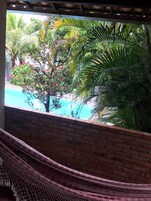 Quarto presidencial, 1 cama King, vista para a piscina | Sacada