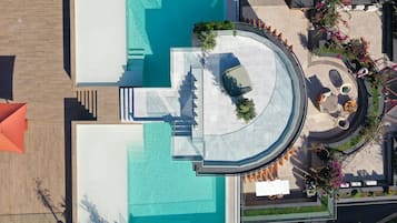 Outdoor pool, open 10:00 AM to 6:00 PM, pool umbrellas, sun loungers