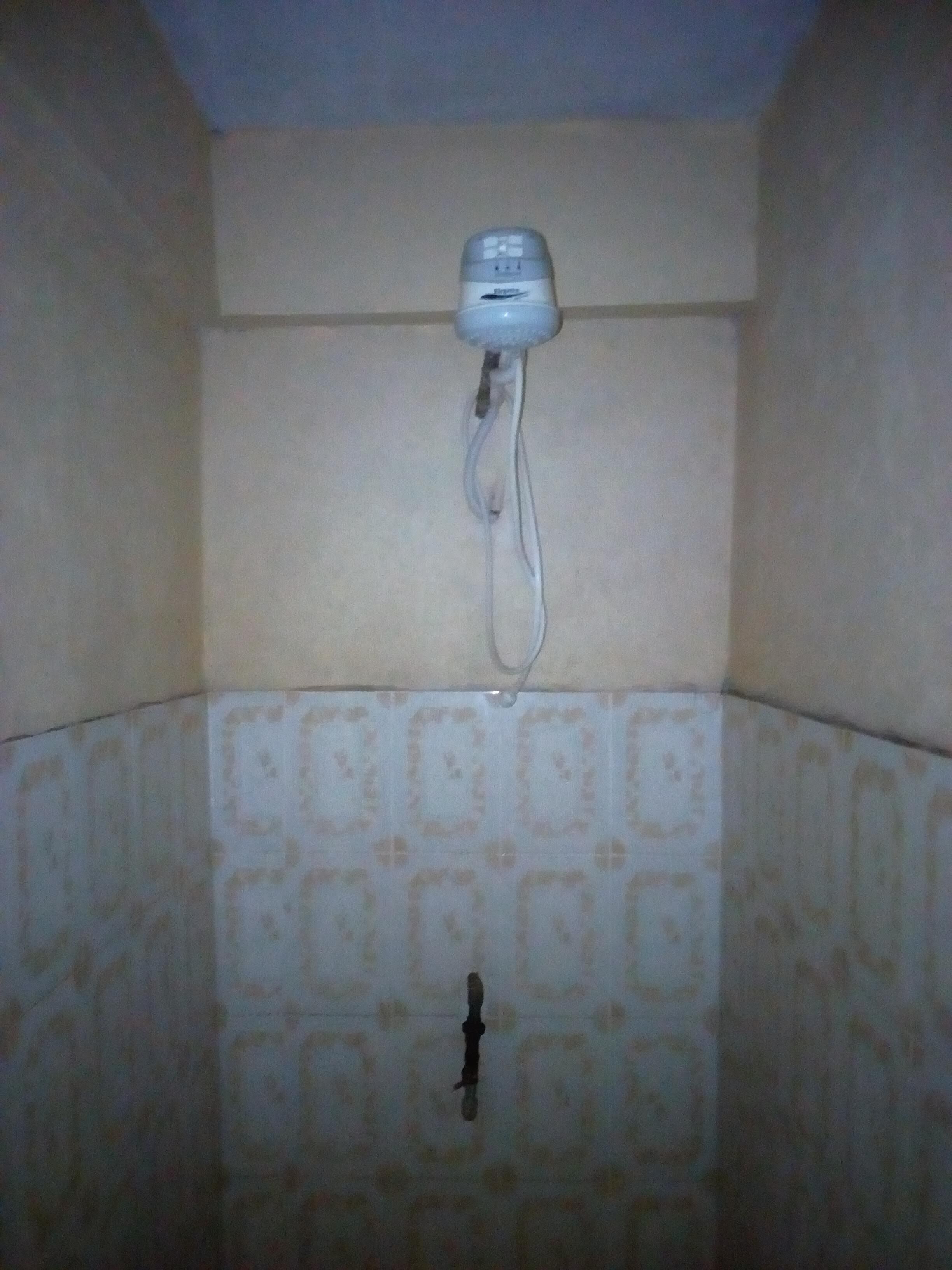 Regadera en el baño