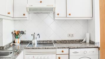Fridge, microwave, cookware/dishes/utensils