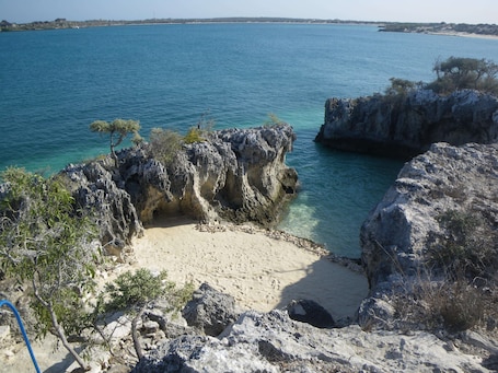 Private beach, white sand. Manga Lodge
