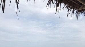A table set for tea with a view of the beach and sea. - Manga Lodge (Andavadoaka)