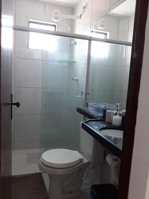Shower, towels, toilet paper