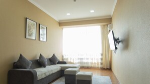 Appartement Standard, 2 chambres | Coin séjour | Télévision LCD