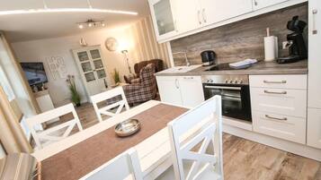 Apartment, 2 Bedrooms | Private kitchen | Fridge, microwave, oven, stovetop